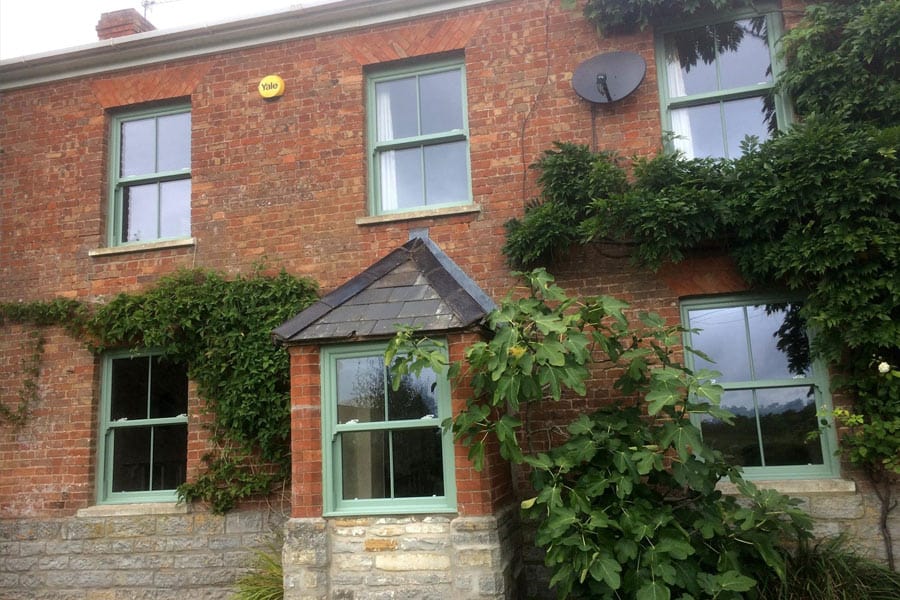 Chartwell green uPVC sliding sash windows