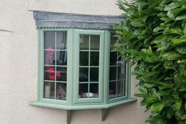 Chartwell green uPVC bow window