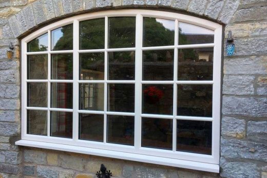 Cream uPVC bespoke curved window