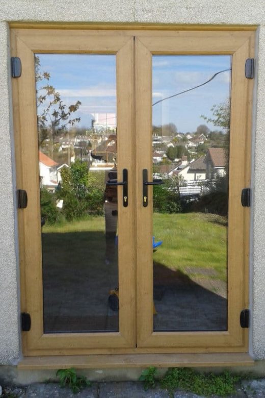 Close up of an Irish oak effect uPVC french door