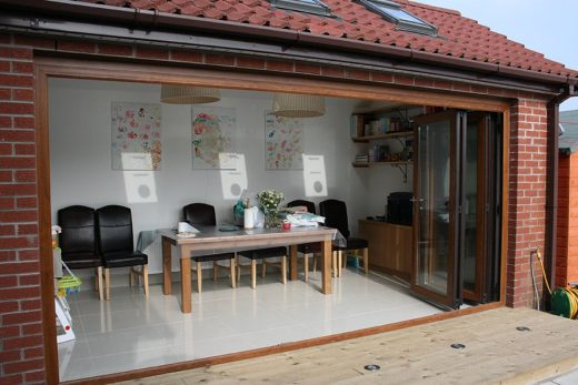 An open coloured uPVC bifold door