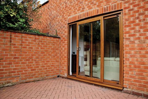 An open golden oak effect uPVC patio door