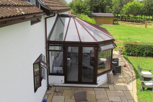 Rosewood effect uPVC victorian conservatory