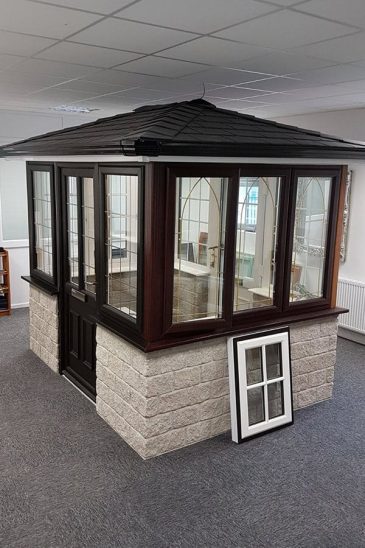 Showroom rosewood effect conservatory and window