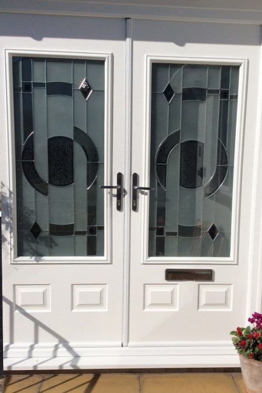 Close up of a white composite french door