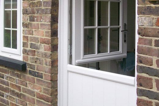 An open white composite stable door