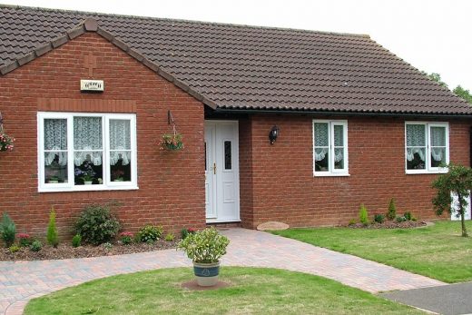 White uPVC casement windows and entrance door