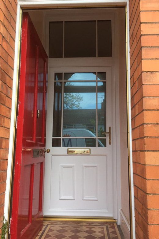 White uPVC second entrance door
